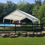 Large frame tent rental next to pool